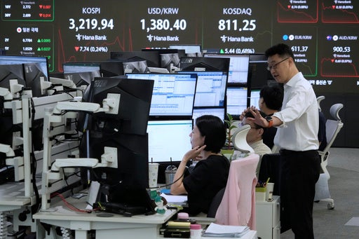 Asian shares are mostly lower, while Tokyo's Nikkei jumps nearly 2%