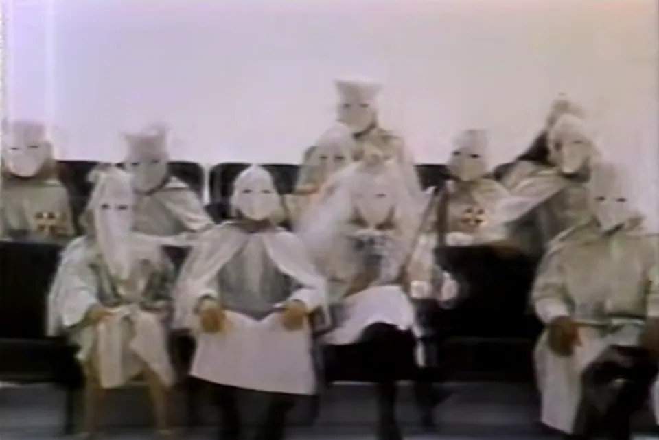 KKK members sitting in a group