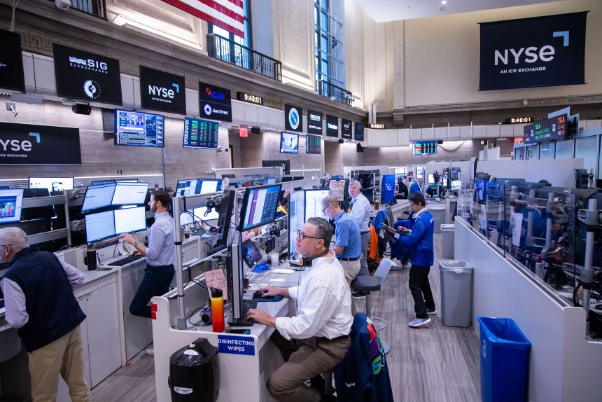 Traders at the New York Stock Exchange on August 8. A tariff on gold imports could significantly affect the global gold trade, experts say.