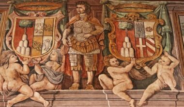 Fresco from Palazzo Cesi in Rome depicting a classical armoured figure flanked by two large heraldic coats of arms, held aloft by cherubs
