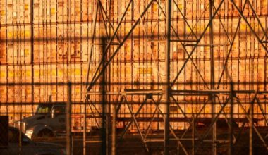 Shipping containers stacked at the Port of Long Beach, California