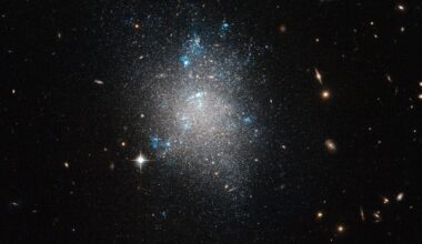 Dwarf galaxies like this one (NGC 5477) are satellites of larger galaxies like the Milky Way. New research examined 36 distant dwarf galaxies to see if they had their own, smaller satellites. The goal is a better understanding of how galaxies form and evolve in the Lambda Cold Dark Matter paradigm. Image Credit: ESA/Hubble &amp; NASA