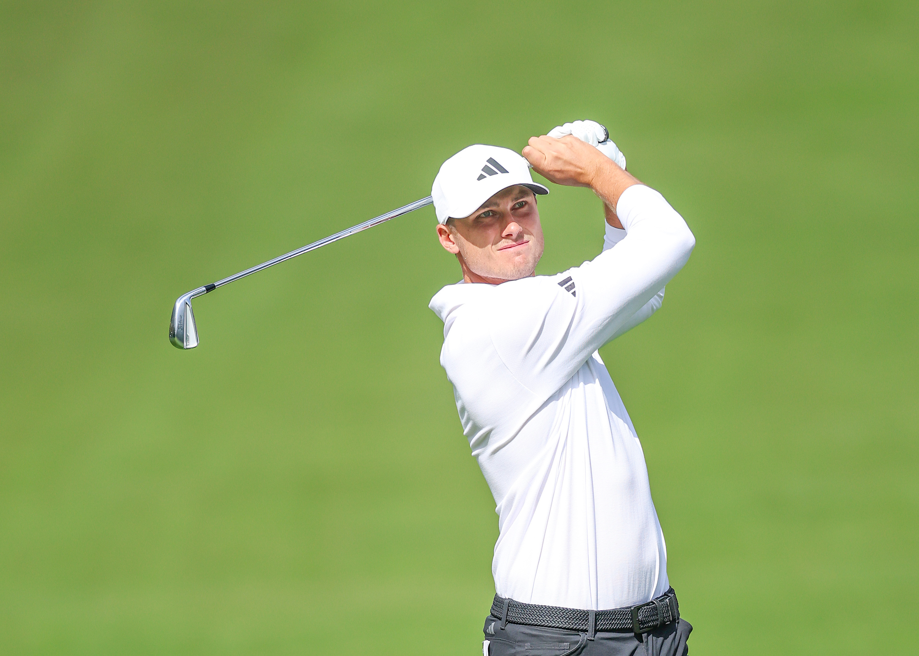 Ludvig Aberg of Sweden playing golf.