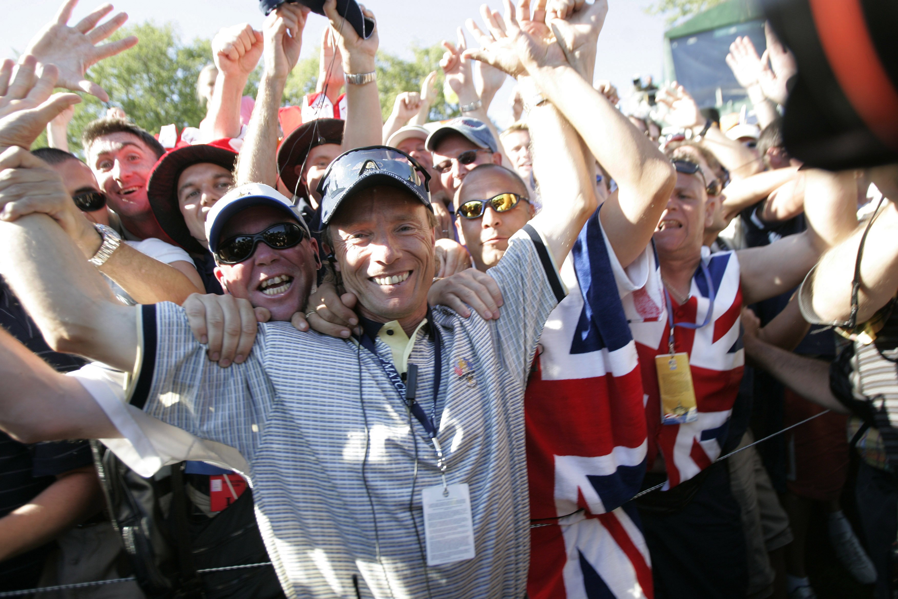 Bernhard Langer celebrates with fans at the Ryder Cup.