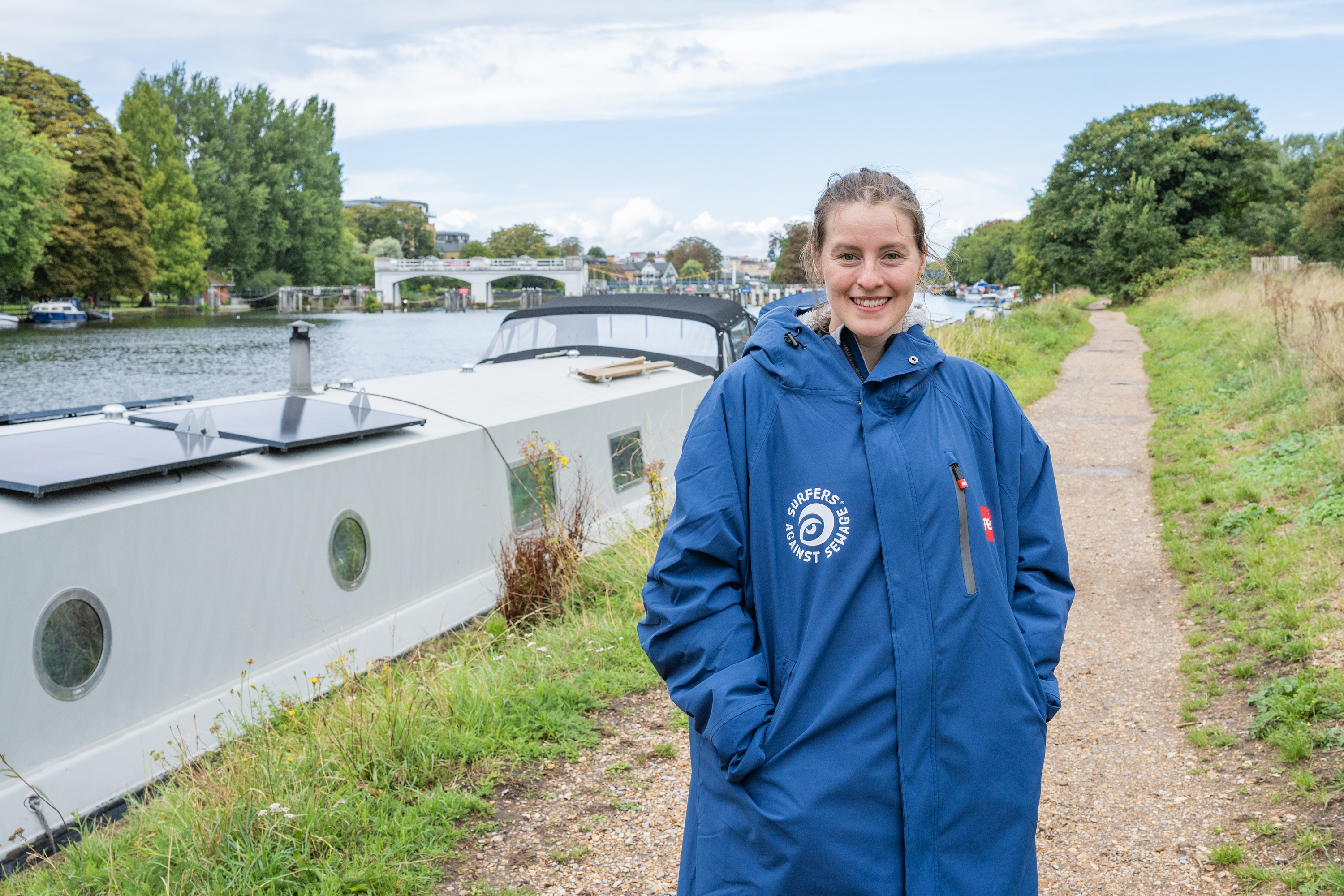 Amber Keegan, a swimmer participating in a protest against sewage pollution, in Teddington Lock, London.