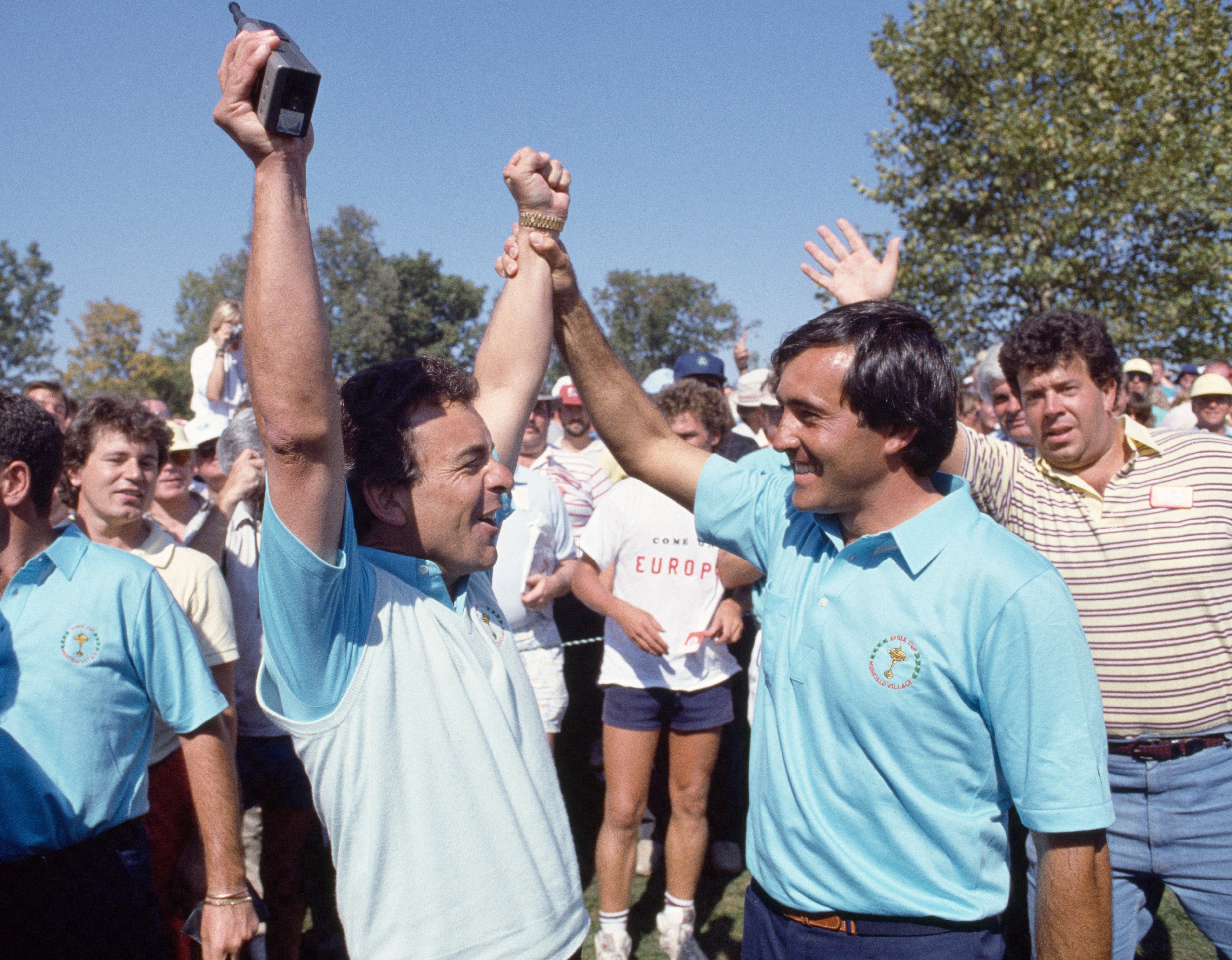 Tony Jacklin and Severiano Ballesteros celebrating Team Europe's 1987 Ryder Cup victory.