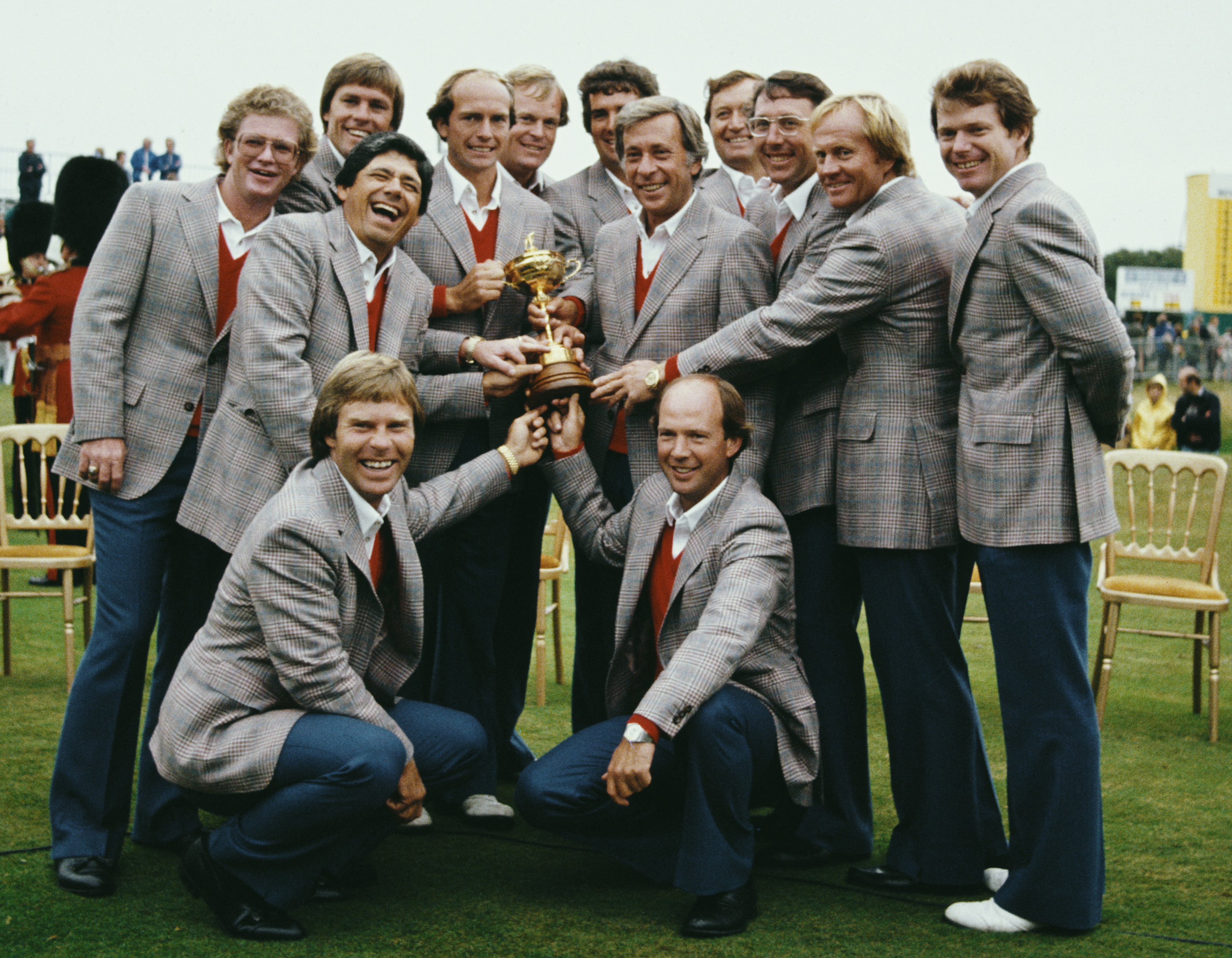 The US Ryder Cup team celebrating their win with the trophy.