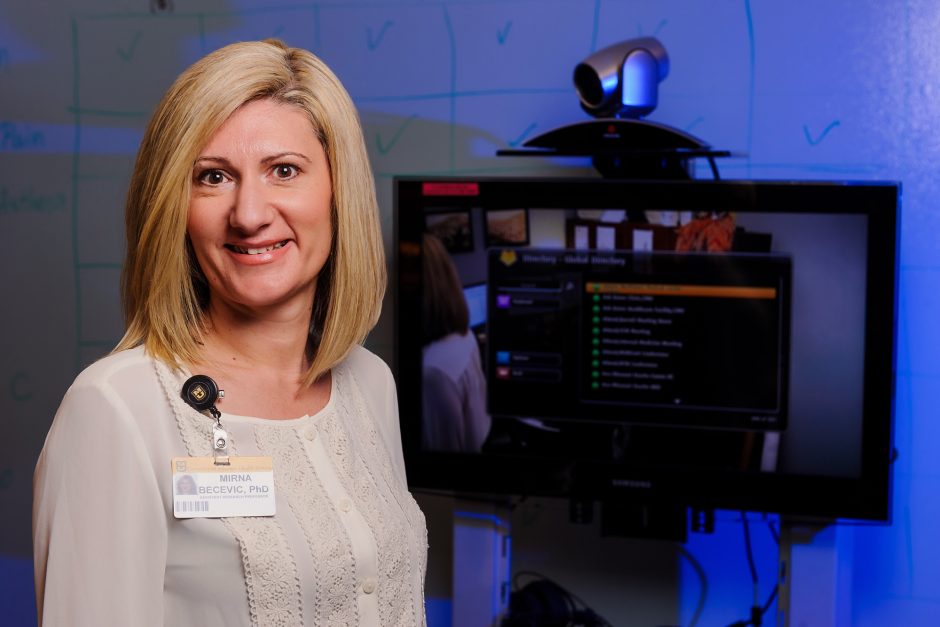 Mirna Becevic in front of monitor