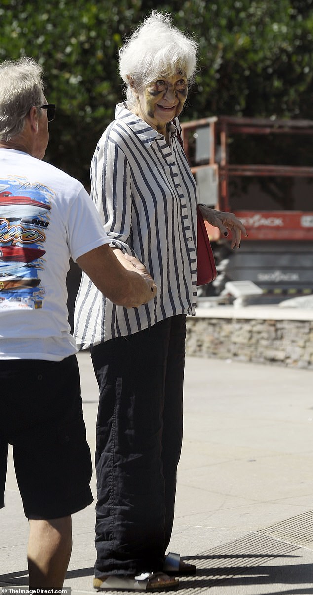 A beloved 90s actress was seen with what appeared to be apparent bruising on her face during a rare outing in Los Angeles this week