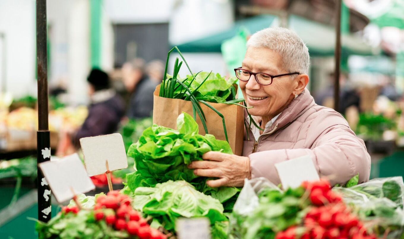 older woman grocery shopping