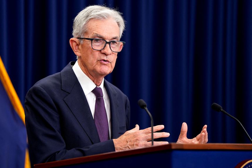 Federal Reserve Chair Jerome Powell speaks at a news conference after Wednesday's interest rate cut.