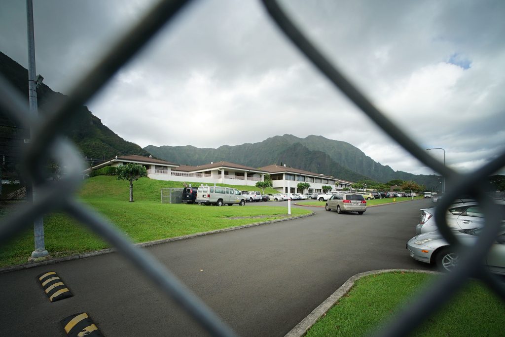 Fence runs along some of the Hawaii State Hospital's bordering area with the Windward Community College campus. The fence ended on the Kahaluu side along where the road met up with the road that runs thru Windward Community College.