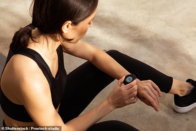 Experts say you can track heart rate using fitness trackers or a heart rate monitor (stock image)