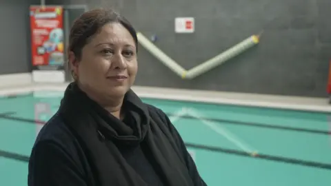 Tahira runs the swim sessions, encouraging the women to get involved