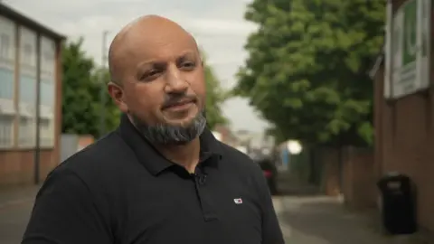 Amjad Ashraf, outside the Pakistan Community Centre in Derby