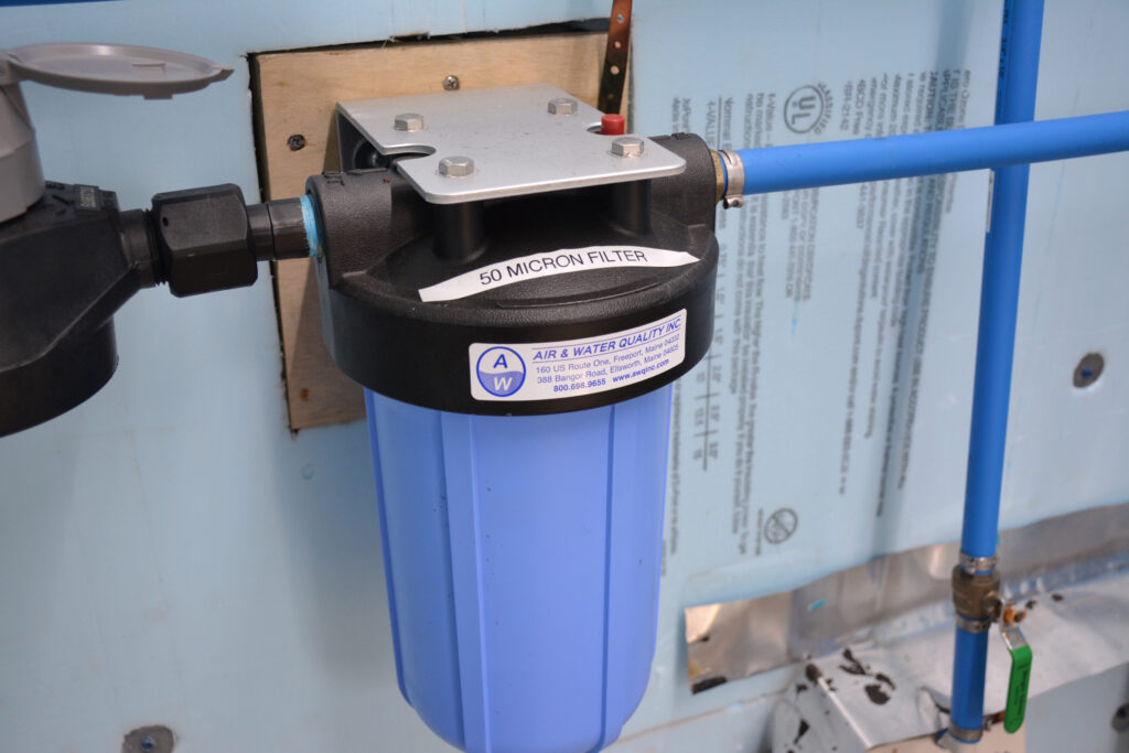 An arsenic filter at the Samaqannihkuk well. High levels of arsenic were found in the water when the Sipayik Environmental Department first tested it, but the filter now keeps the water at safe levels. Credit: Sydney Cromwell/Inside Climate News