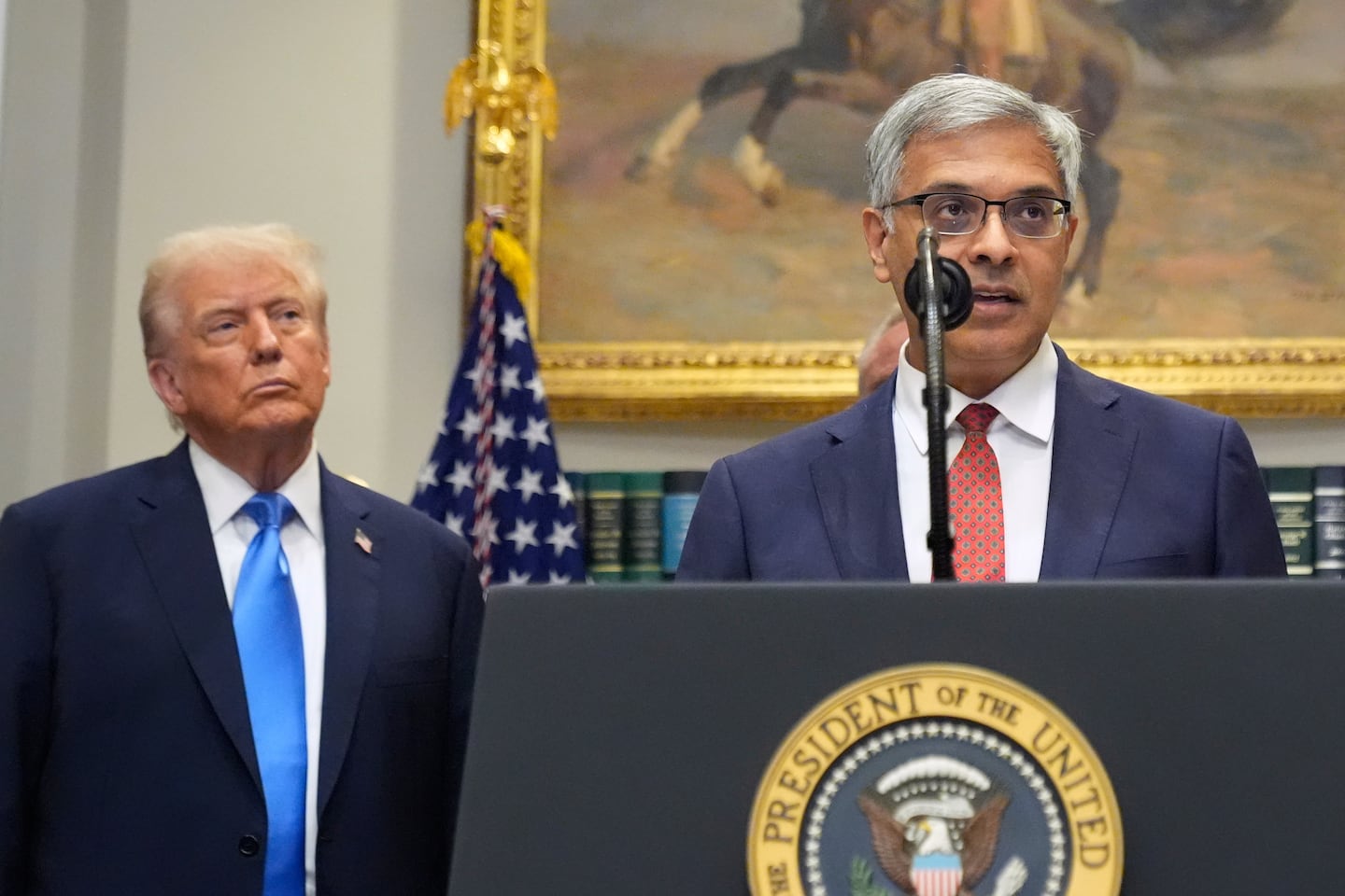 President Trump listens as Dr. Jay Bhattacharya, director of the National Institutes of Health, speaks in the Roosevelt Room of the White House, Monday, Sept. 22, 2025, in Washington. 