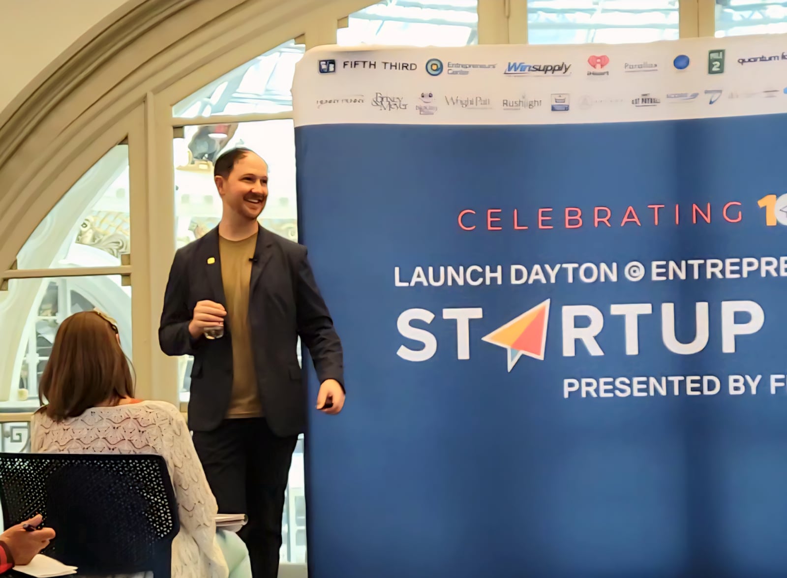 Fifth Third Bank's Nate Sowder laughs amid his keynote presentation on the first day of Launch Dayton Startup Week, Sept. 9, 2025. LONDON BISHOP/STAFF