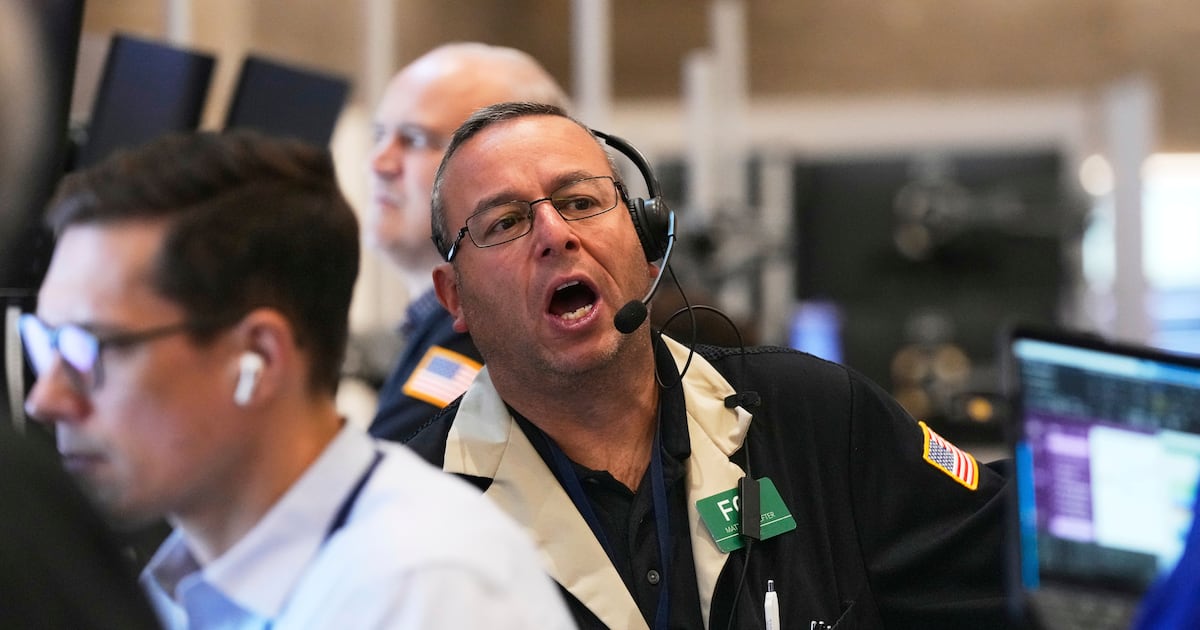 Wall Street ticks toward another record