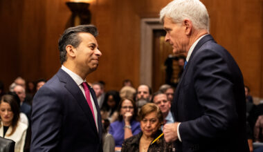 A photo of Marty Makary in a Senate hearing room speaking to Sen. Bill Cassidy.