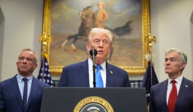 President Trump speaks in the Roosevelt Room of the White House, Monday, Sept. 22, 2025, in Washington, as Health and Human Services Secretary Robert F. Kennedy Jr., left, and Centers for Medicare & Medicaid Services administrator Dr. Mehmet Oz listen.