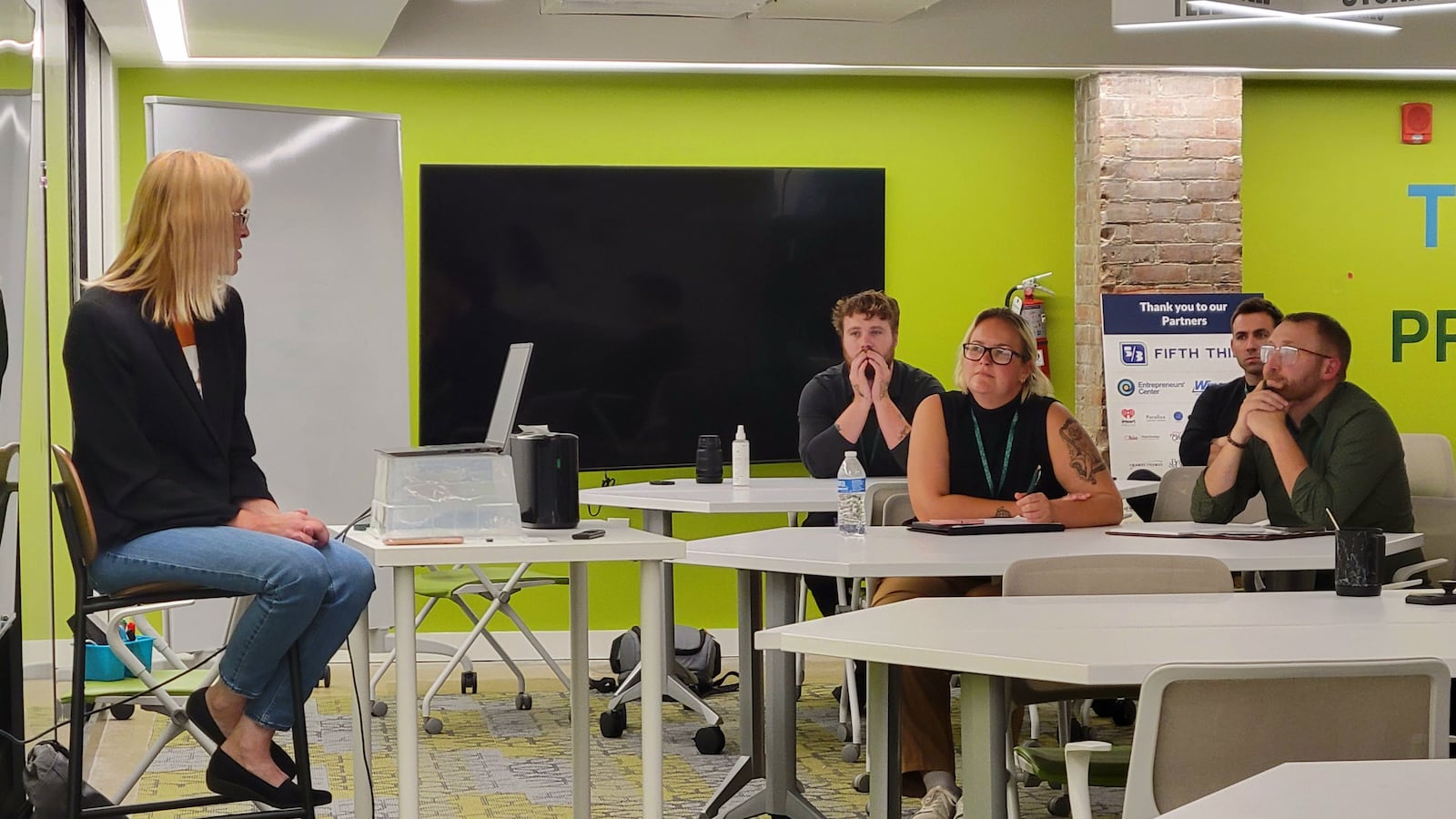 Lisa Crum (left) gives a presentation on navigating the restaurant industry as a startup entrepreneur at Launch Dayton Startup Week, Sept. 10, 2025. LONDON BISHOP/STAFF