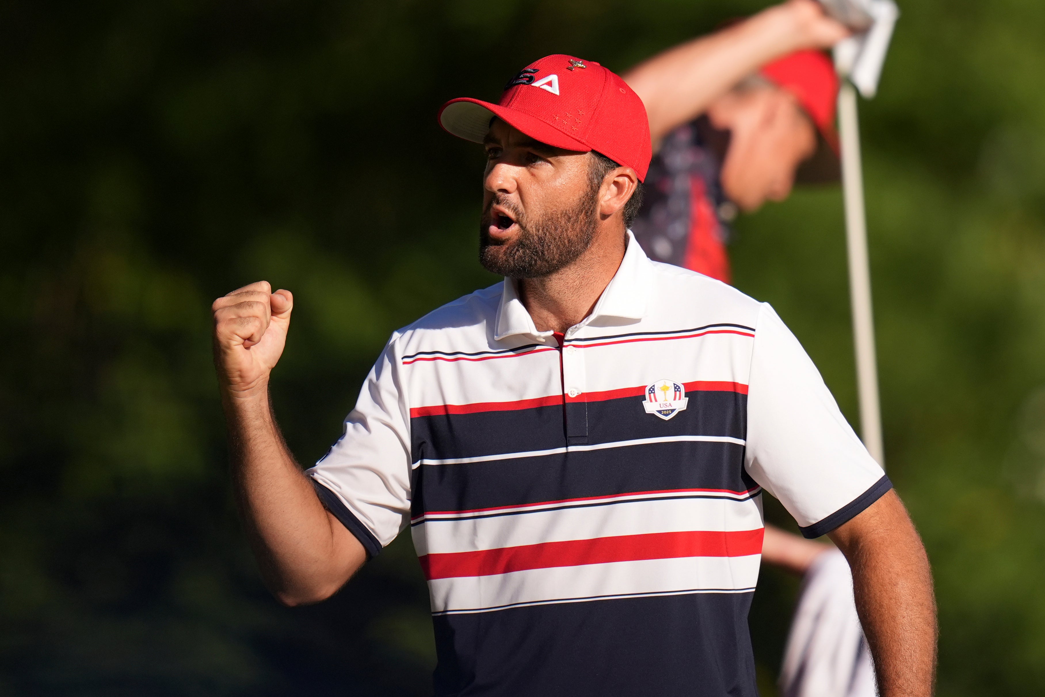 United States' Scottie Scheffler celebrates