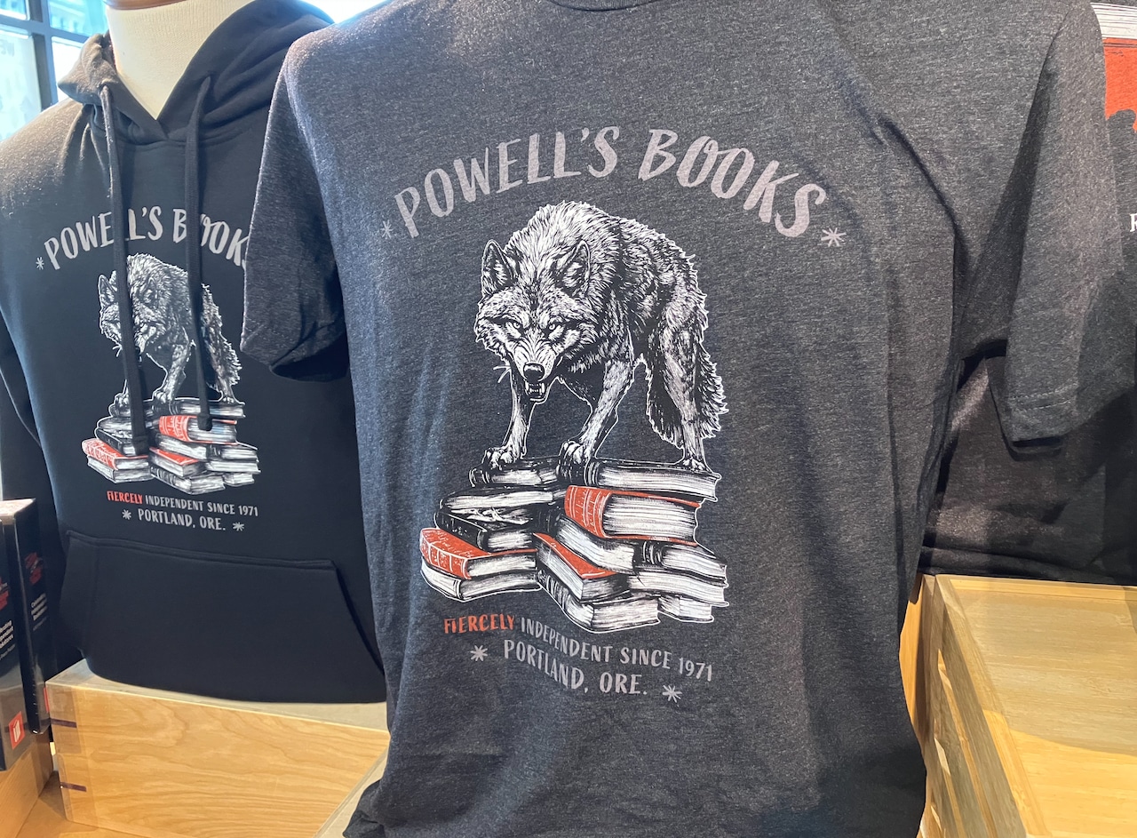 A ‘wonky’ image on a Powell’s Books T-shirt was generated with help from AI. It caused an uproar
