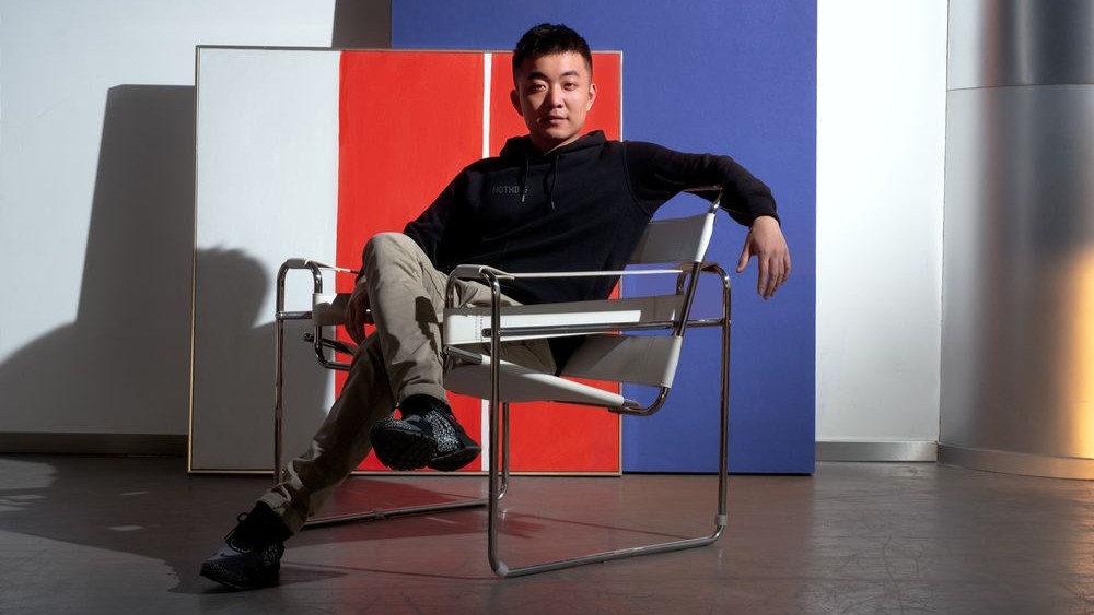 Nothing CEO Carl Pei sitting on a chair