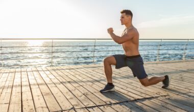 Man performing bodyweight lunges outdoors next to ocean