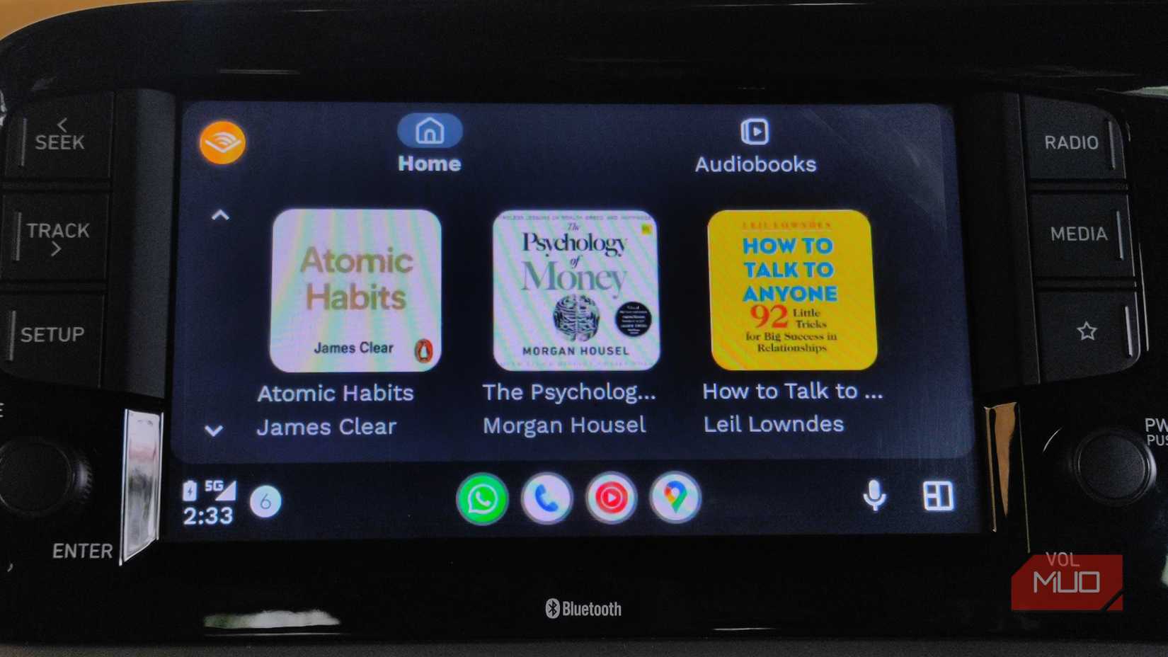 Audible app home screen with multiple books visible on Android Auto.
