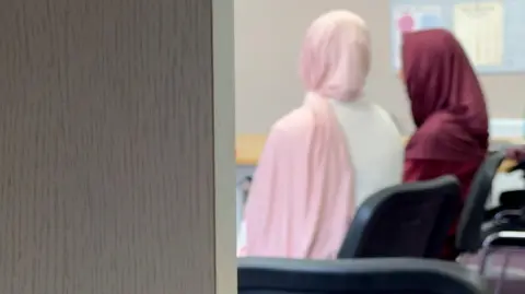 Neighbours Hawa and Anaiya