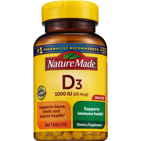Bottle of NatureMade D3 supplement on white background