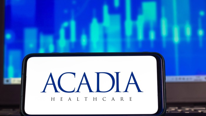 Acadia Healthcare logo seen displayed on a smartphone