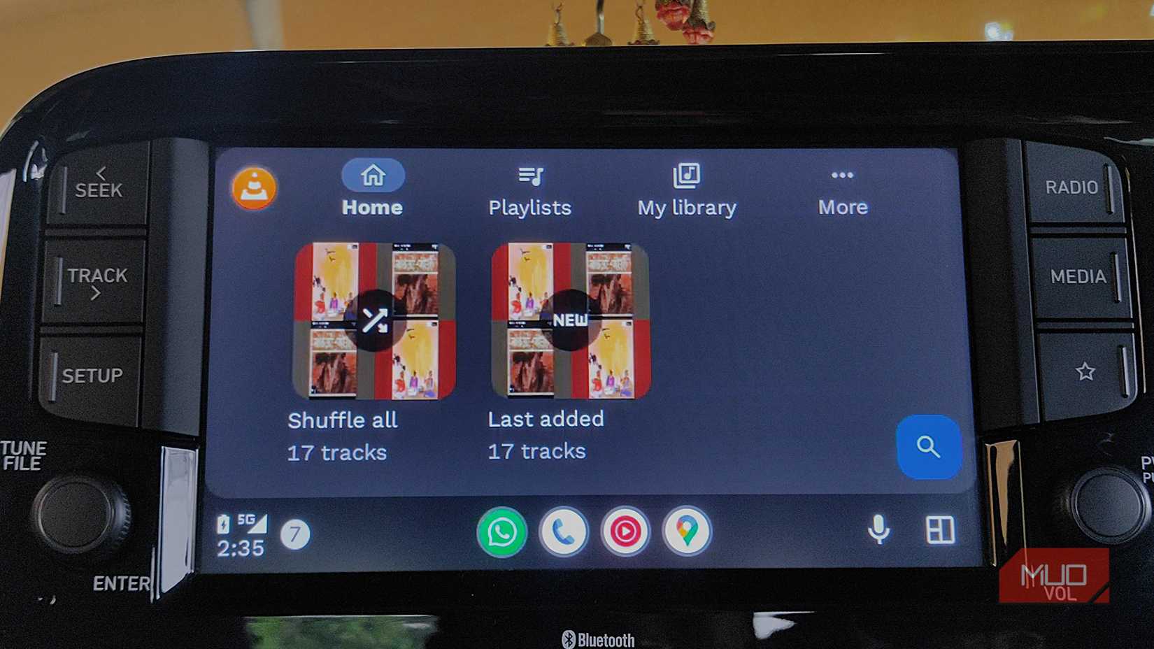 VLC Media Player on Android Auto with multiple library options visible.