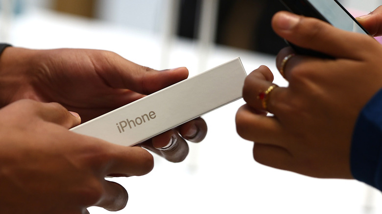 A customer buying an iPhone.