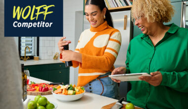 Friends preparing a healthy meal in the kitchen.