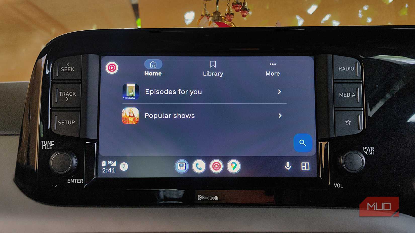 YouTube music Home library with multiple playlists visible on Android Auto.