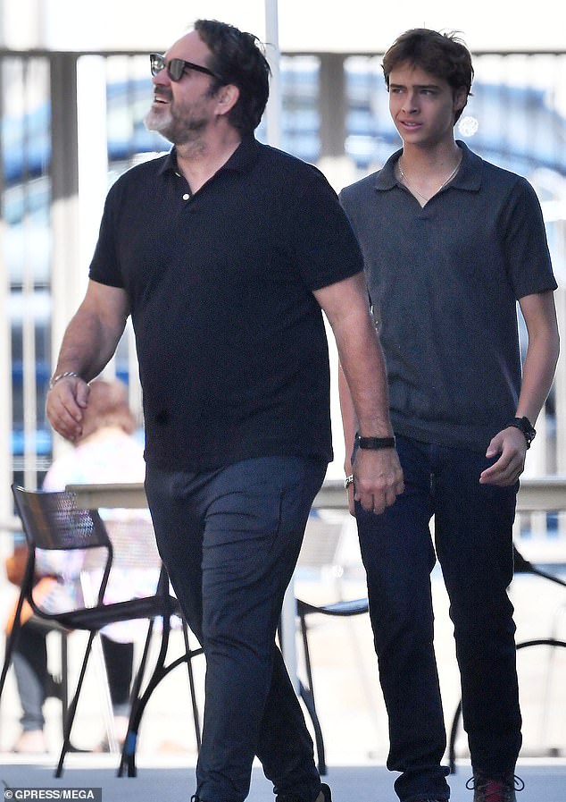 He was joined by his lookalike son, Gus