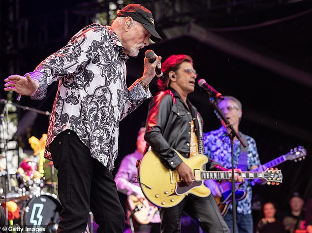 John Stamos joined Love on stage during Riot Fest at Douglass Park on September 20 in Chicago, Illinois