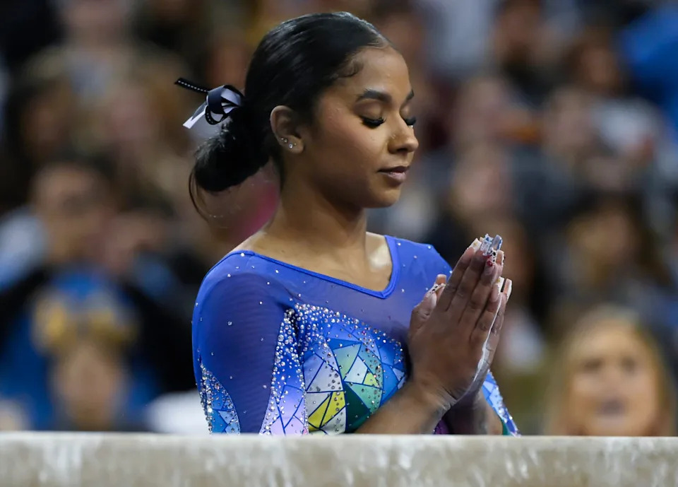 UCLA gymnast Jordan Chiles before starting her balance beam performance during an NCAA gymnastics meet against Penn State at Pauley Pavilion presented by Wesco. Robert Hanashiro-Imagn Images