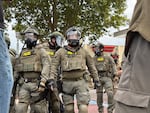 FILE: Enforcement officers at the U.S. Immigration and Customs Enforcement facility, Portland, Ore., Oct. 4, 2025.