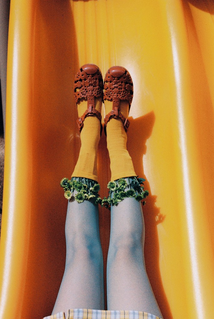Woman's feet on colourful slide (Courtesy Takoyaki/Lomography)