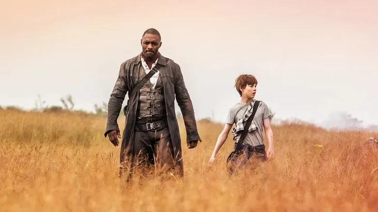Roland and Jake walking through a field in The Dark Tower