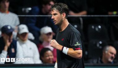 Cameron Norrie punches his fist in celebration