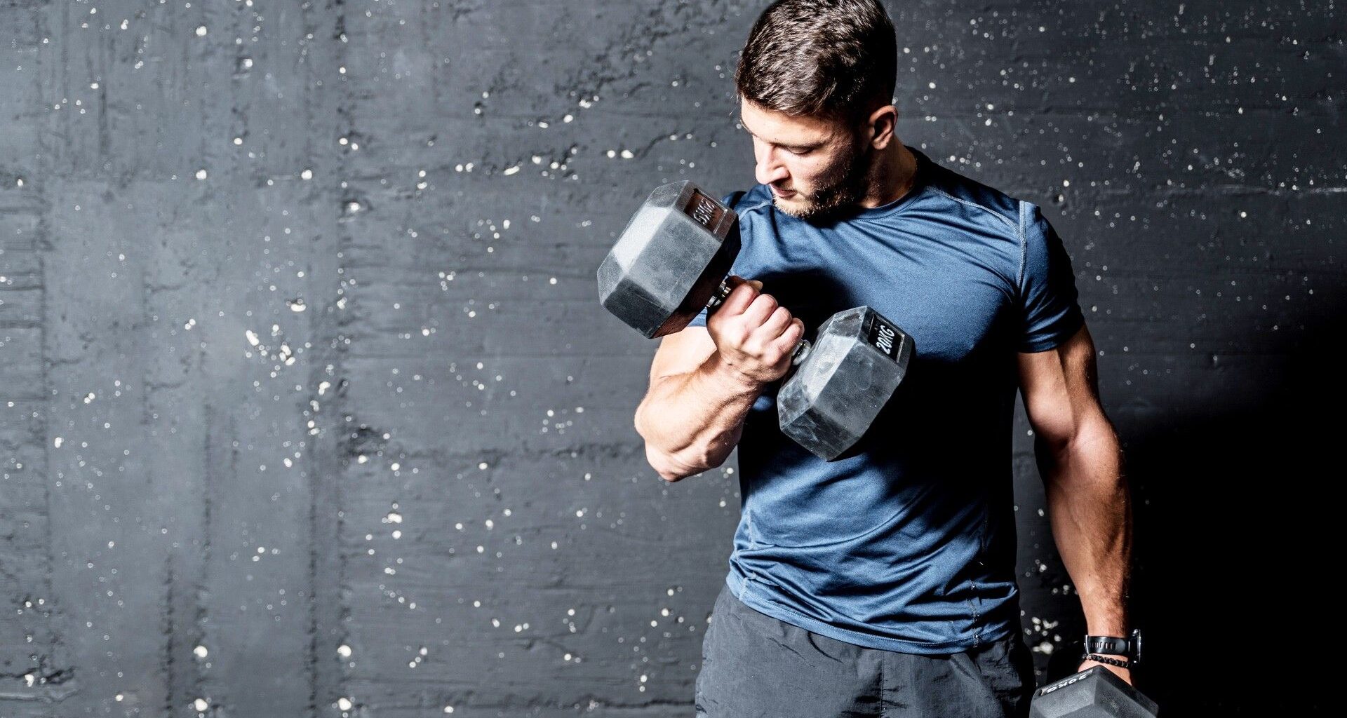 Man performing.a dumbbell bicep curl