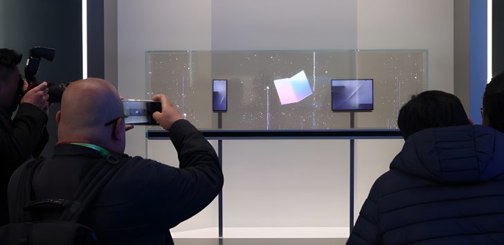 Samsung Galaxy S23 devices displayed in a glass case.
