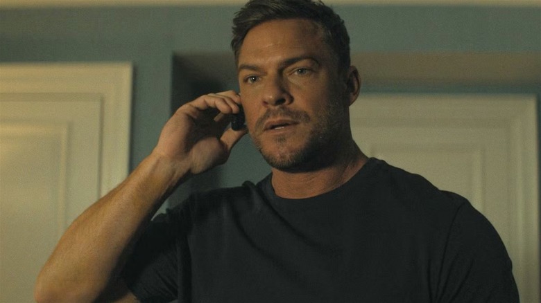 Reacher speaks to Susan Duffy on a miniscule cell phone in Reacher