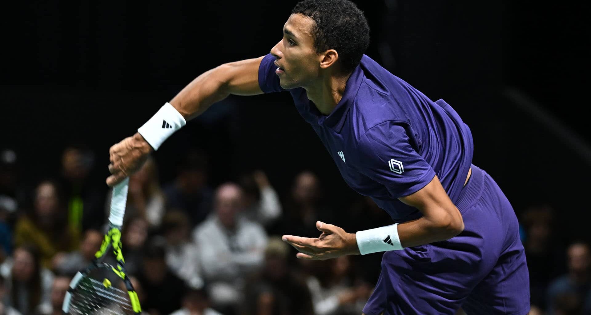 Felix Auger-Aliassime overcomes Alexandre Muller in three sets on Wednesday in Paris.