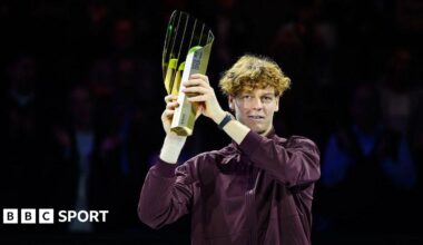Jannik Sinner of Italy poses with his Vienna Open trophy